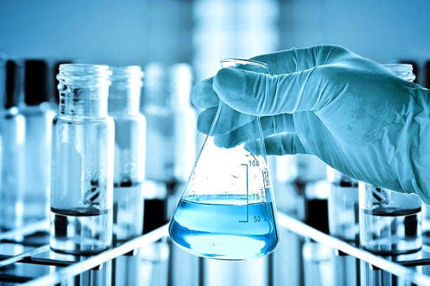 Clear treated water in a laboratory flask